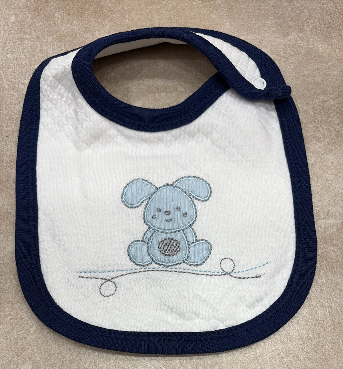 Bavette Neonato in Cotone Trapuntato con Ricami.