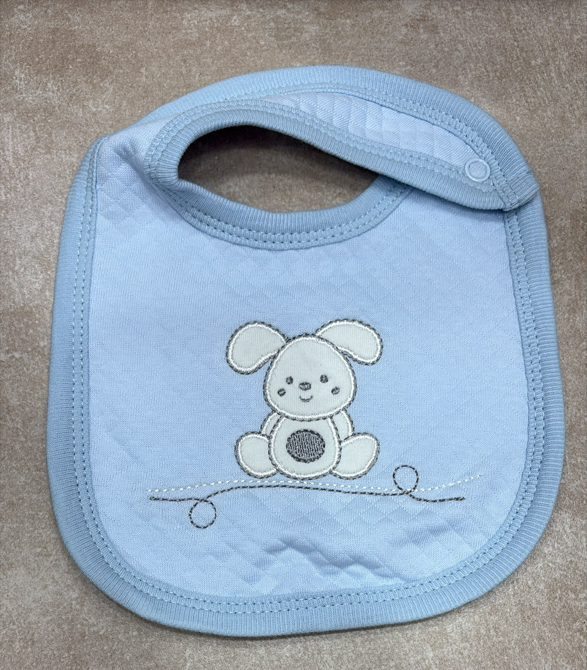 Bavette Neonato in Cotone Trapuntato con Ricami.